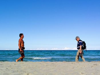 Woman standing on beach