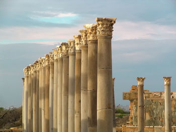 Old ruins of building against cloudy sky