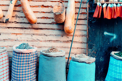 Close-up of clothes hanging on wall