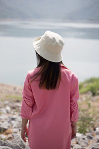 Rear view of woman looking at sea