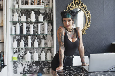 A portrait of a young woman in a hair salon.