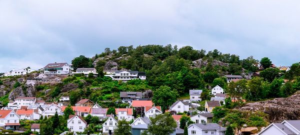 High angle view of town against cloudy sky