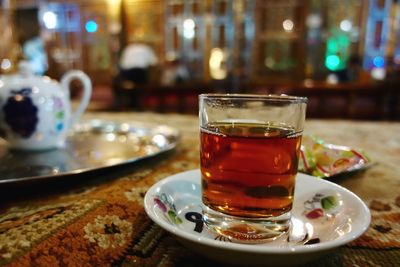 Black tea. a glas and a pot. in a persian restaurant