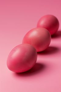 Close-up of pills against pink background