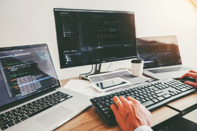Man using laptop on table