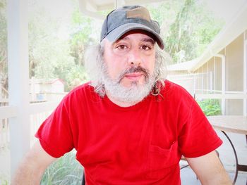 Portrait of man standing outdoors