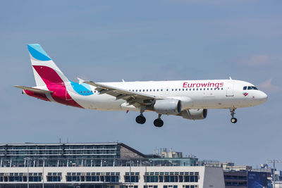 Airplane flying against clear blue sky