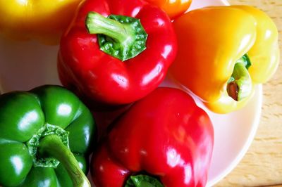 Close-up of bell peppers in plate on table