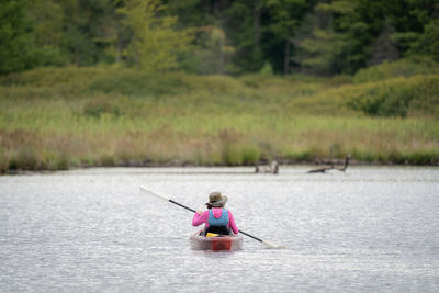 Man surfing in lake