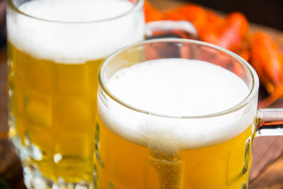 Close-up of beer glass on table