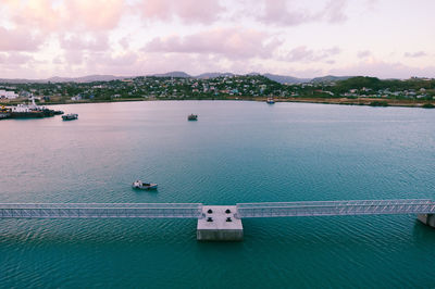 High angle view of bridge over sea against sky