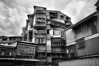 Low angle view of residential building against sky