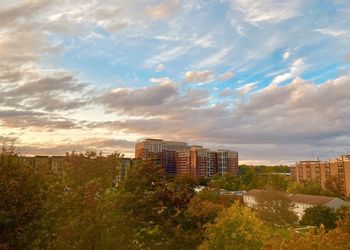 High angle view of buildings against sky during sunset