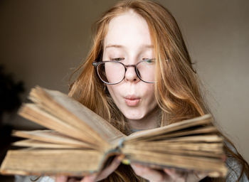 Portrait of young woman looking away