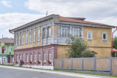 Buildings in city against sky