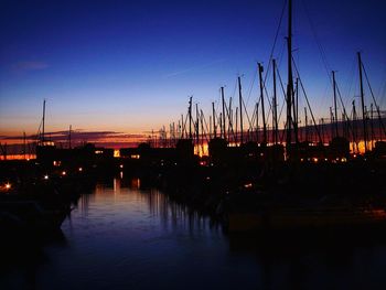 View of harbor at sunset