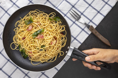 Directly above shot of person in plate