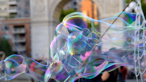 Close-up of bubbles against blurred background