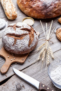 High angle view of bread on cutting board