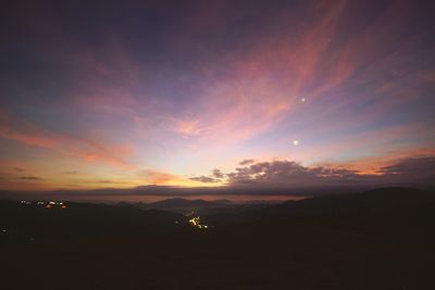Scenic view of dramatic sky during sunset