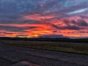 Scenic view of dramatic sky during sunset