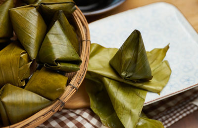 High angle view of leaves in basket on table
