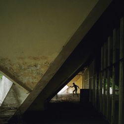 Woman standing against wall