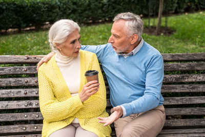 Couple sitting on bench