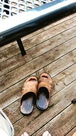 Low section of shoes on wood