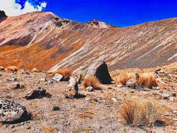 Scenic view of rock formations against sky