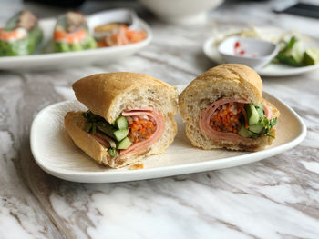 Close-up of burger in plate on table