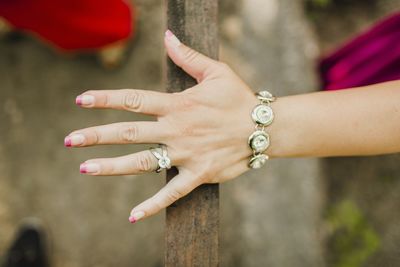 Close-up of woman hand on wearing bracelet