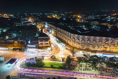 High angle view of illuminated city buildings at night