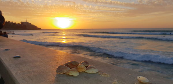 Scenic view of sea against sky during sunset