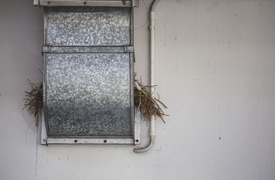 Close-up of window on wall of building