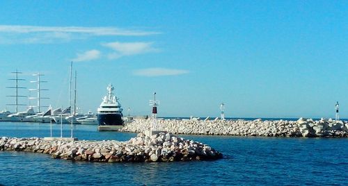 View of ship in sea against sky