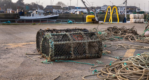 Stack of fishing net at harbor