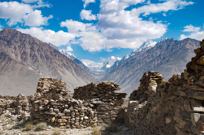 Panoramic view of snowcapped mountains against sky