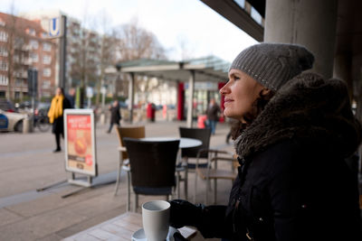 Woman having coffee