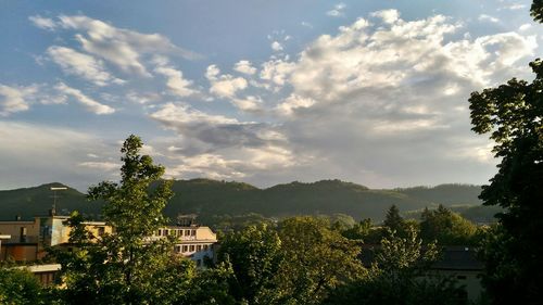 Scenic view of mountain against cloudy sky