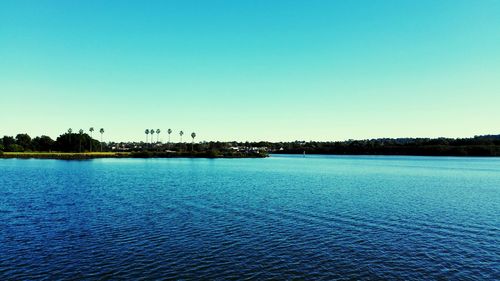 Scenic view of calm sea against clear sky