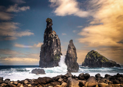 Rock formation on beach against sky - rocks of ribeira da janela 2