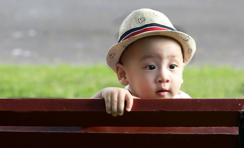 Portrait of cute boy looking away
