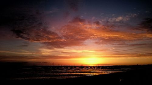 Scenic view of sea at sunset