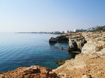 Scenic view of sea against clear sky