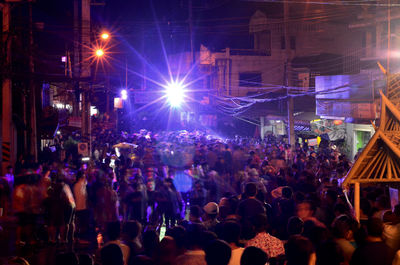 Crowd at music concert at night