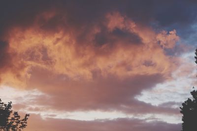 Low angle view of cloudy sky during sunset