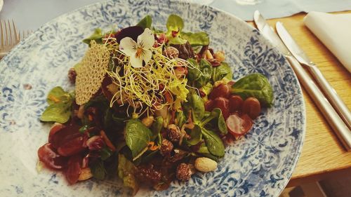 High angle view of vegetables in plate on table