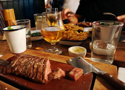 Glass of food on table at restaurant