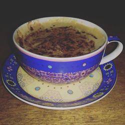 Close-up of tea cup on table